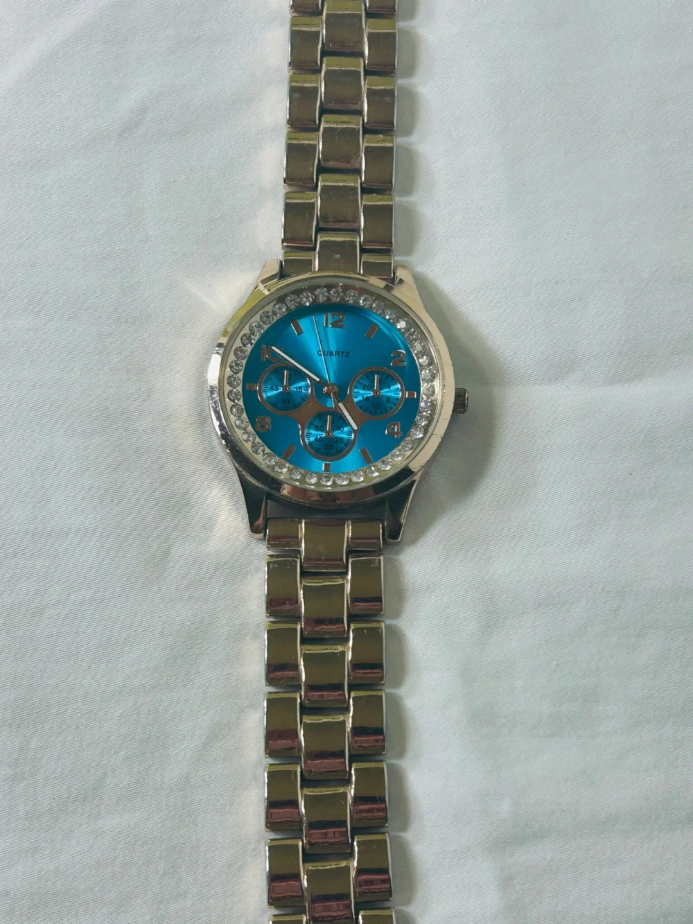 Women's Blue Crystal Accent Quartz Watch with Gold-Tone Bracelet